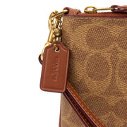 Picture of Coach Clutch Bow Wristlet in Brown, Leather