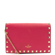 Picture of Valentino Cross Body Rockstud Spike Cross Body Clutch in Pink, Calfskin