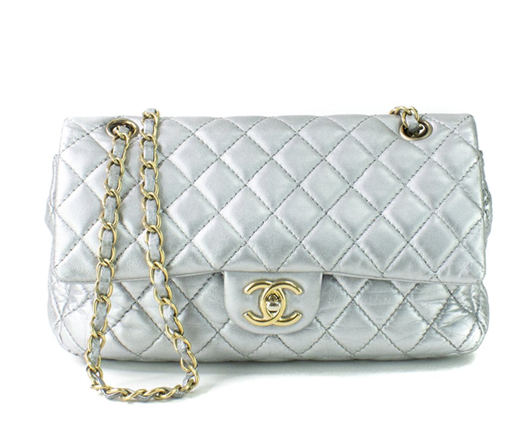 White and on sale gold chanel bag